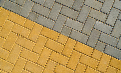 yellow and grey paving tile for background or texture