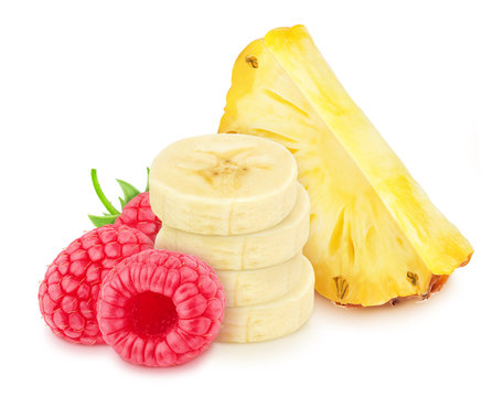 Multicolored composition with pineapple, banana and raspberry, isolated on a white background with clipping path.