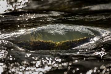 water flowing over rocks