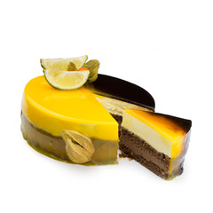 Slice cake with mirror glaze decorated with lime and physalis.