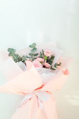 Beautiful carnation bouquet on white background