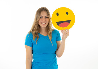 Beautiful young woman holding happy face emoji emoticon social media notification icon.