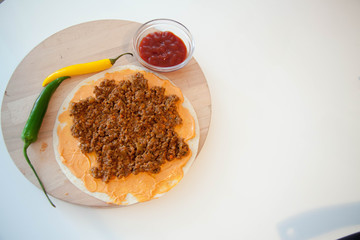 Delicious tortillas on kitchen table