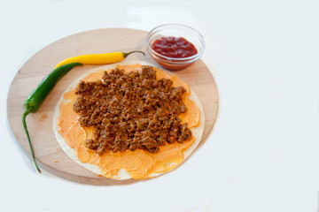 Delicious tortillas on kitchen table
