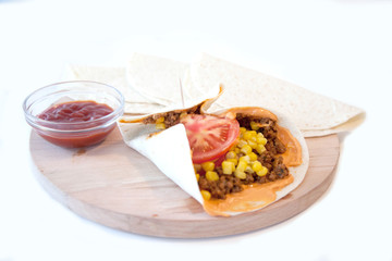 Delicious tortillas on kitchen table