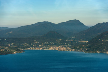 Aerial view of the Lake Garda, the largest Italian lake of glacial origin, with the small town of Salo. Brescia province, Lombardy, Italy, Europe