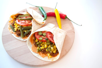 Delicious tortillas on kitchen table