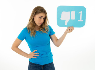 Beautiful Sad young woman holding dislike social media notification icon
