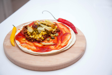 Delicious tortillas on kitchen table