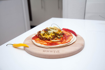 Delicious tortillas on kitchen table