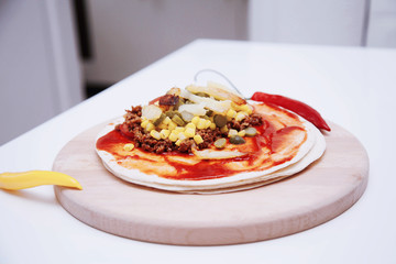 Delicious tortillas on kitchen table