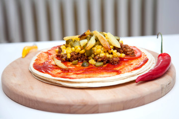 Delicious tortillas on kitchen table
