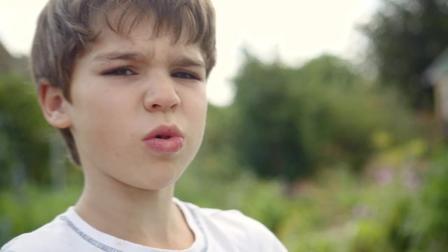 child has a penchant for natural science. examines the mummified head of a bird