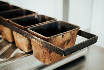 Cast iron molds for baking bread in the bakery