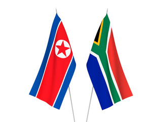 National fabric flags of Republic of South Africa and North Korea isolated on white background. 3d rendering illustration.