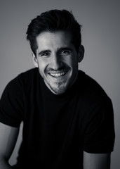 Young attractive latin man posing looking sensual and handsome. Beauty concept and lifestyle