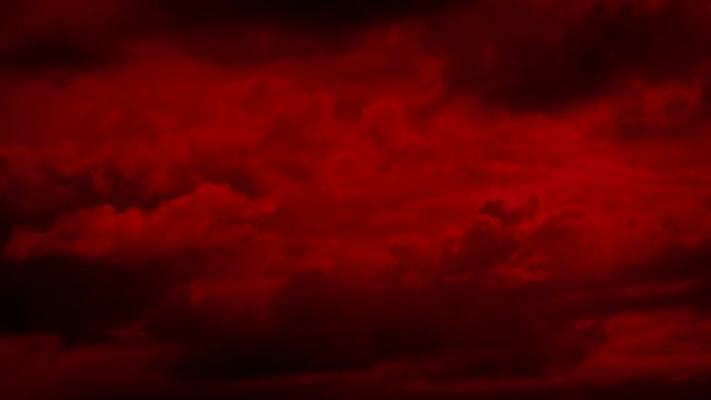 Clouds Forming In Apocalyptic Red Sky