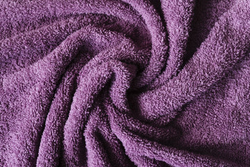 Naklejka na ściany i meble Top view purple towel texture