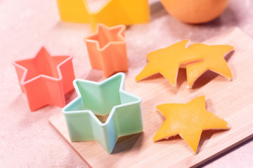 Stars from orange zest for decoration before Christmas