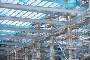 The structure of building as a background, Steel construction in large construction site, Space for text in template