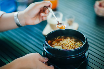 Hot and delicious noodle in a bowl, selective focus