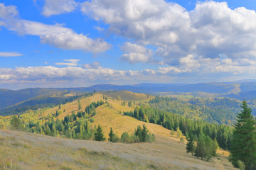 Fototapeta na wymiar Autumn landscape of the Carpathian mountains on a slightly cloudy day.