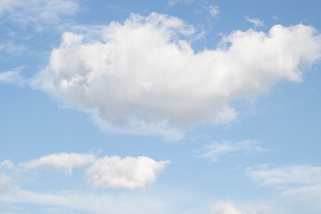 Naklejka na ściany i meble White clouds blue sky background, natural texture.