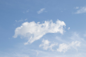 Naklejka na ściany i meble White clouds blue sky background, natural texture.