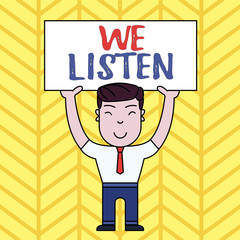 Naklejka premium Text sign showing We Listen. Business photo showcasing Group of showing that is willing to hear anything you want to say Smiling Man Standing Holding Big Empty Placard Overhead with Both Hands