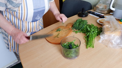 woman cutting vegetables