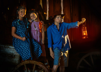 children frolic and shine wind lamps in the fall