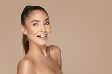 Beauty portrait of young brunette girl.
