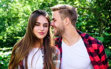 Fototapeta premium Couple in love. Enjoying each other. Man hipster and pretty woman in love. Summer vacation. Fall in love. Pure feelings. Romantic date concept. Cuddling with darling. Beautiful people. Happy together