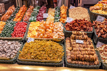Candied fruits in famous market Boqueria in Barcelona of Spain