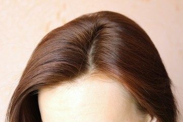 Women's hair is a top view close-up
