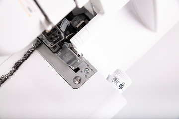 Overlock stitch. Overlock for sewing fabric. Tailoring