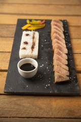 Tuna sirloin with peppers and rice