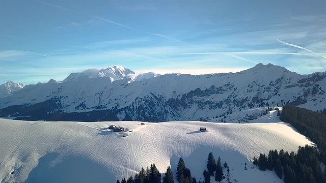 Aerial of wooden chalets on the top of the Meg&egrave;ve ski resort, Haute-Savoie, France
