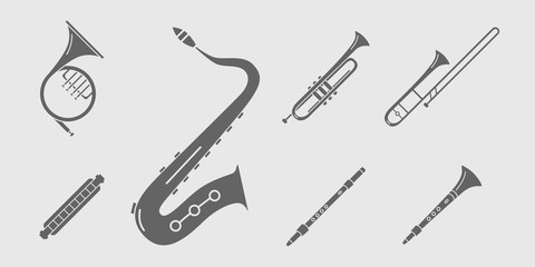 Music instruments Icons set - Vector solid silhouettes of wind instruments, saxophone, sax, tube, mouth organ and flute for the site or interface