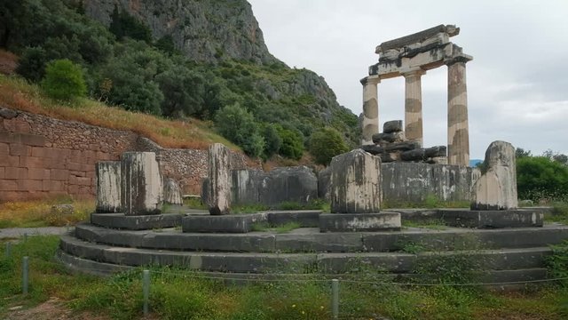 Tholos with Doric columns at the Athena Pronoia temple ruins in Delphi, Greece