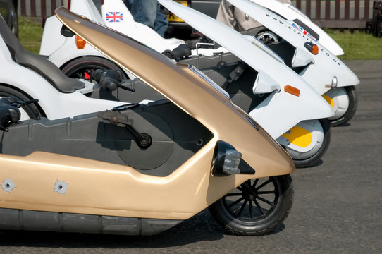 A line of Sinclair C5 electric vehicles on display at the Green Energy Transport event at Santa Pod, UK - April 23, 2010