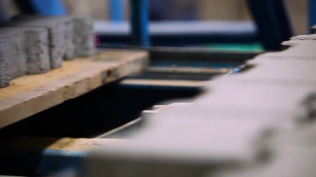 Production Line Inside A Road Pavement Factory. Interlocked Pavement Blocks