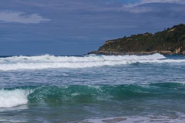 Fototapeta na wymiar Big sea waves in San Sebastian, Donostia, Spain.