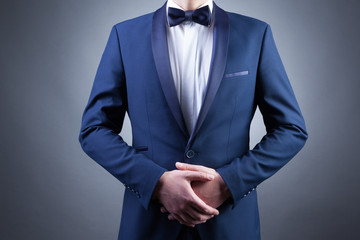 Photo of stylish man in elegant blue suit