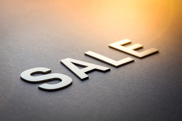 Word sale written with white solid letters