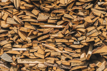 stacks of firewood. firewood for the winter, .dry chopped pile of firewood. wall of fire wood background.
