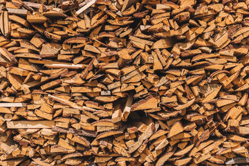 stacks of firewood. firewood for the winter, .dry chopped pile of firewood. wall of fire wood background.