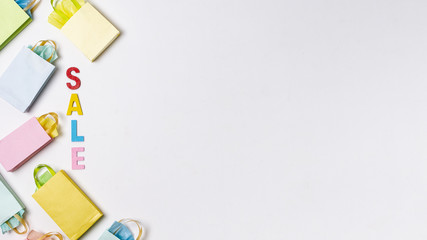 Sales with paper bags concept with copy space