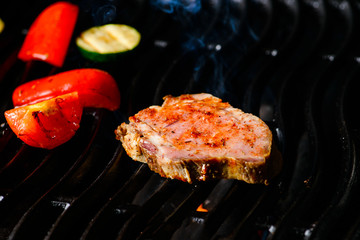 grilled raw steak and vegetables