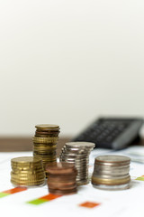 Front view variety of coins and blurred background